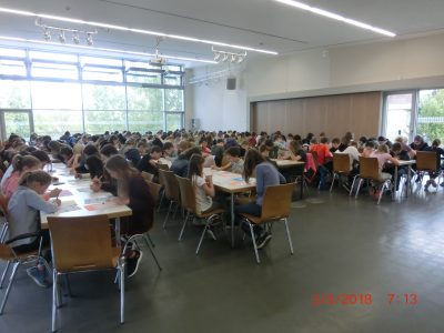 The students are sitting in our auditorium. They are 171 students from Otto Schott Gymnasium Jena in Germany and this is the largest number ever in our history. The caretakers had to bring in a whole row of new tables and chairs.
Thank you for the opportunity.